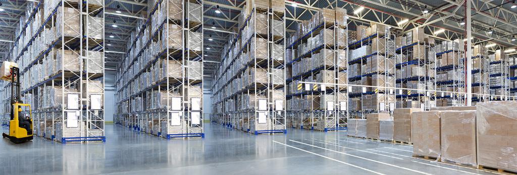 AdobeStock_275489975_v2.jpeg (Huge distribution warehouse with high shelves...